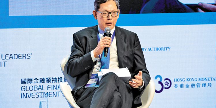 香港金管局前总裁力推港元稳定币!陈德霖:立法监管前先测试